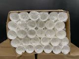 a box full of plastic cups sitting on top of a cardboard box