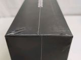 a black box with a green stripe on it