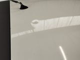 a black and white photo of a bathroom with a toilet and sink