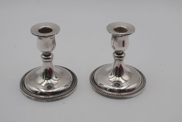 Paire de chandelier en métal argenté H : 10cm
