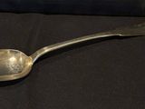 a spoon that is sitting on a table
