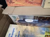 two books that are sitting in a cardboard box