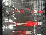 many different types of pliers in a plastic case