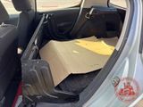 a cardboard box in the back of a car