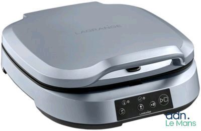 an image of a close up of a waffle maker on a white background