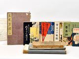 a lot of books that are sitting on a table