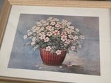 painting of a basket of flowers with pink and white flowers in it