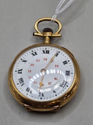 a gold pocket watch with roman numerals on it
