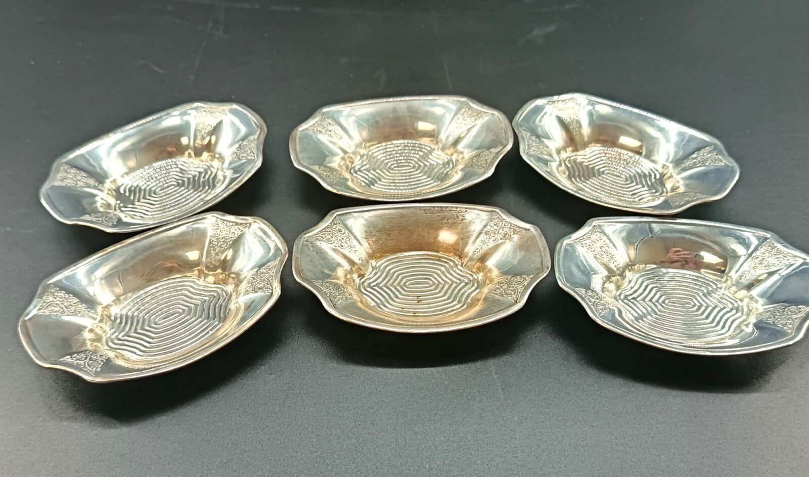 6 cendriers en argent, travail Américain. 95 grs