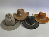 several hats are lined up in a row on a white surface