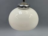 an image of a white light bulb hanging from a ceiling