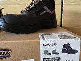 a box with a pair of shoes on top of it