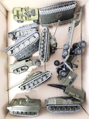 a box full of toy military vehicles in it