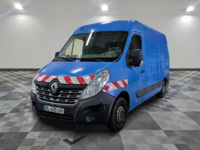la photo d'une camionnette bleue garée dans un garage