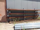a bunch of benches that are outside of a building