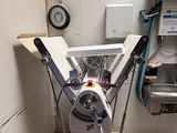 a machine that is sitting on a stand in a room