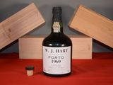 a bottle of wine that is sitting on a table
