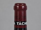 a bottle of wine that is sitting on a table