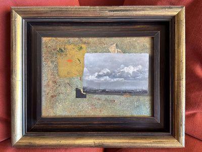 an image of a picture of a painting on a red cloth