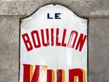 a sign that says bouilon kuur on the side of a building
