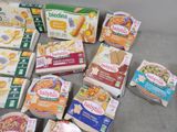 many boxes of food that are sitting on a table