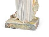 a statue of a woman holding a baby in her arms