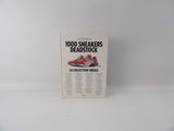 un livre sur lequel figure l'image d'une paire de baskets