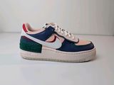the nike air force 1 low is a low - top sneak with a multicolored sole