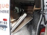 a van that has a bunch of furniture in it