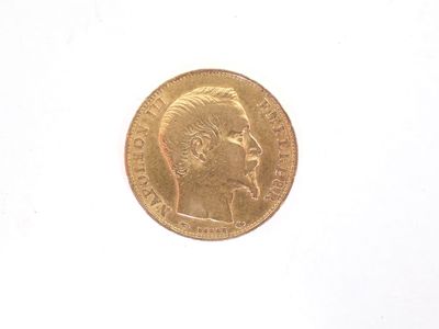 l'image d'une pièce d'or sur laquelle figure le visage d'un homme
