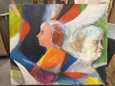 un tableau représentant une femme et un homme, posé sur un chevalet