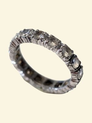 an image of a wedding ring with diamonds on it