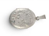 an image of a silver locke with a bird and flower design on it