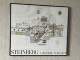 a picture of a map hanging on the wall of a room