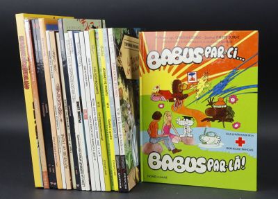 a lot of books that are sitting on a table