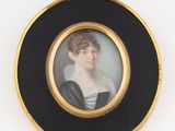 portrait of a woman in a black and white dress in a gold frame