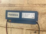 a close up of a sign on the side of a brick wall