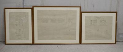 three framed architectural drawings of a house and a building