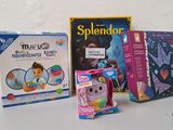 several children ' s books are lined up on a table