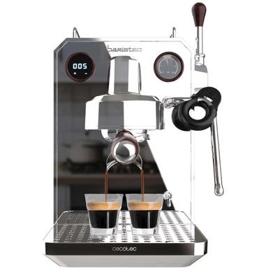 an image of a coffee machine with two cups of coffee