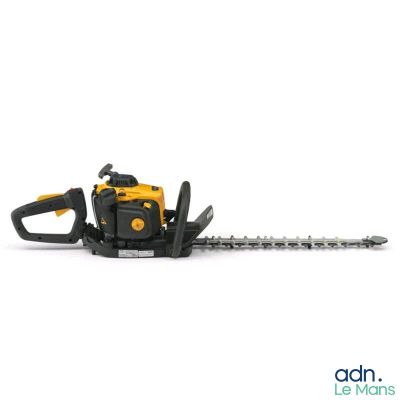 a close up of a chainsaw on a white surface