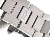a close up of a watch on a white surface