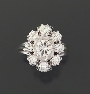 Bague en or gris rhodié 18K 750 millièmes ornée d'un diamant…
