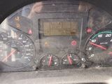 a close up of a car dashboard with a speedometer