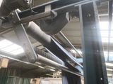 a picture of a large metal pipe in a building