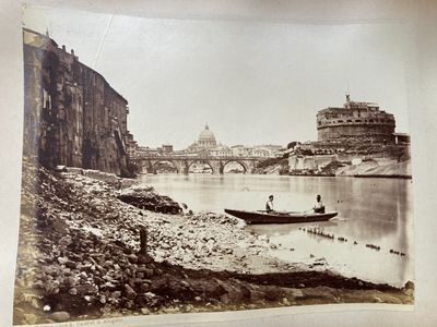 a black and white photo of a boat on the water