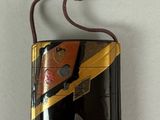 a black and gold case with a bird on it