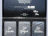 a black box with three cards that say je je je je je je je je je je je je je je je je je je je je