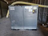 a machine that is sitting in a garage