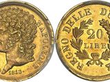a gold coin with a bust of a man on it